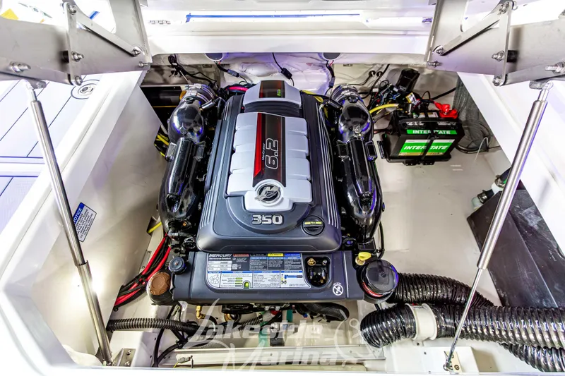 Slide: The Image of 2026 Chaparral SSX 6 boat engine compartment with Mercury 6.2L 350 HP engine. - 15