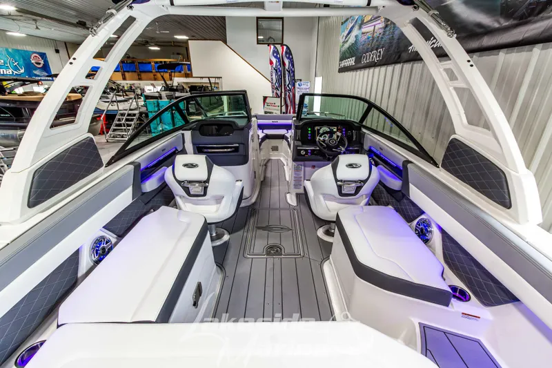 Slide: The Image of 2026 Chaparral SSX 6 boat interior with modern seating and dashboard design. - 11