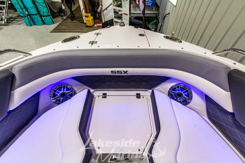 Slide: The Image of Interior of 2026 Chaparral SSX 6 boat with illuminated speakers and seating. - 36