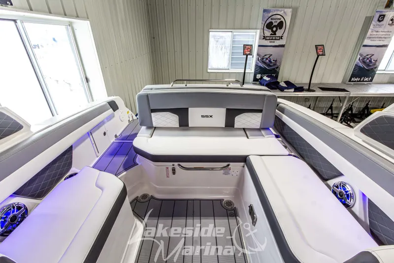 Slide: The Image of 2026 Chaparral SSX 6 boat interior with luxurious seating and modern design. - 13