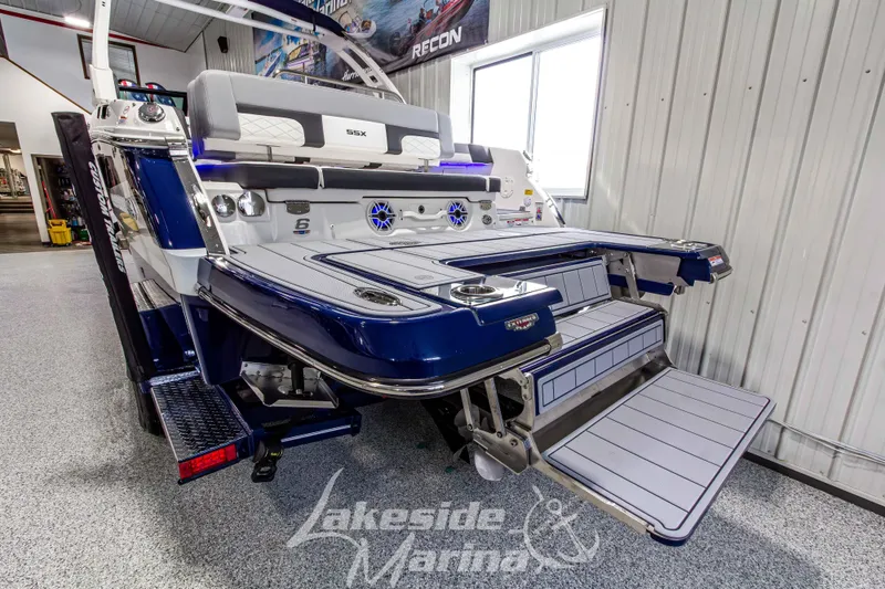 Slide: The Image of 2026 Chaparral SSX 6 boat in showroom, featuring sleek design and modern amenities. - 5