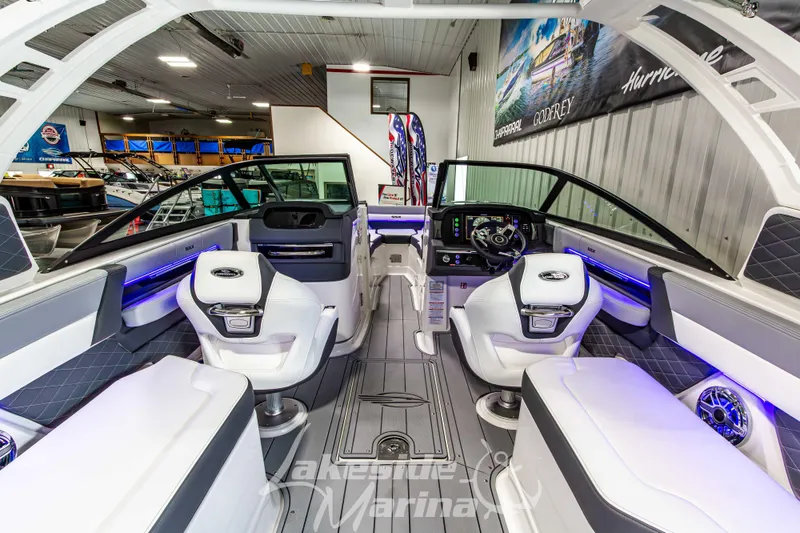 Slide: The Image of Interior of 2026 Chaparral SSX 6 boat with modern seating and dashboard. - 16