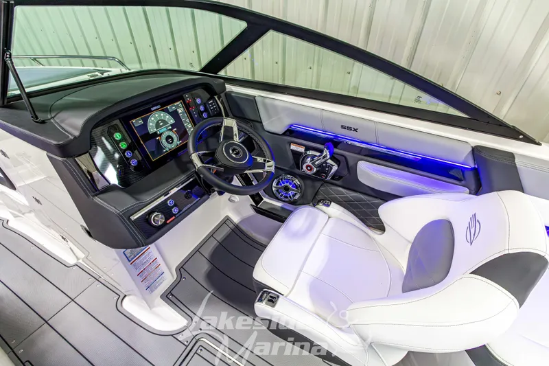 Slide: The Image of 2026 Chaparral SSX 6 boat interior with modern dashboard and steering wheel. - 18