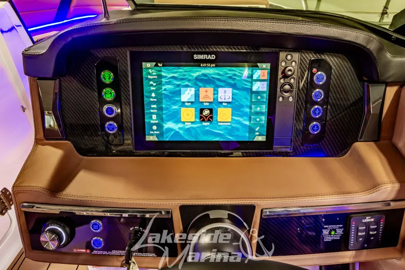 Slide: The Image of 2026 Chaparral SSX 6 dashboard with Simrad touchscreen and control panel. - 13