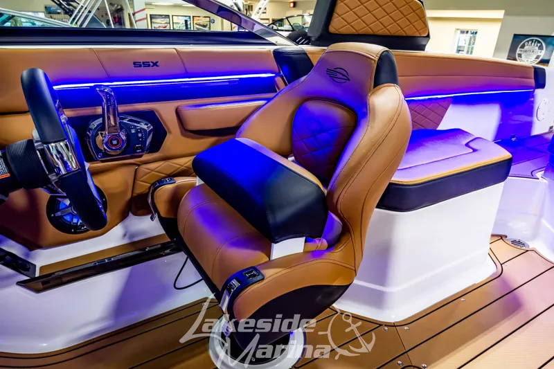 Slide: The Image of Luxurious interior of 2026 Chaparral SSX 6 boat with leather seating and modern controls. - 16