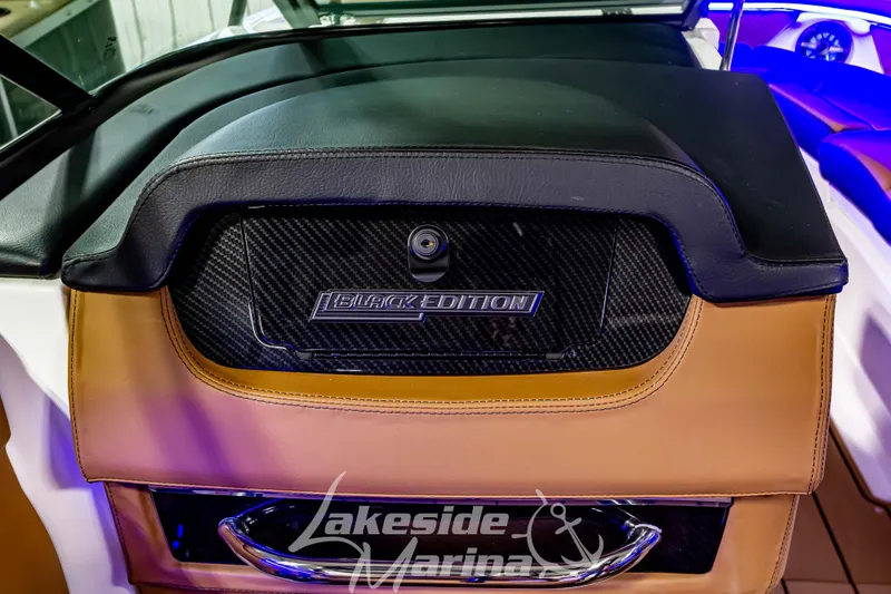 Slide: The Image of 2026 Chaparral SSX 6 Black Edition interior with luxury leather and carbon fiber accents. - 19