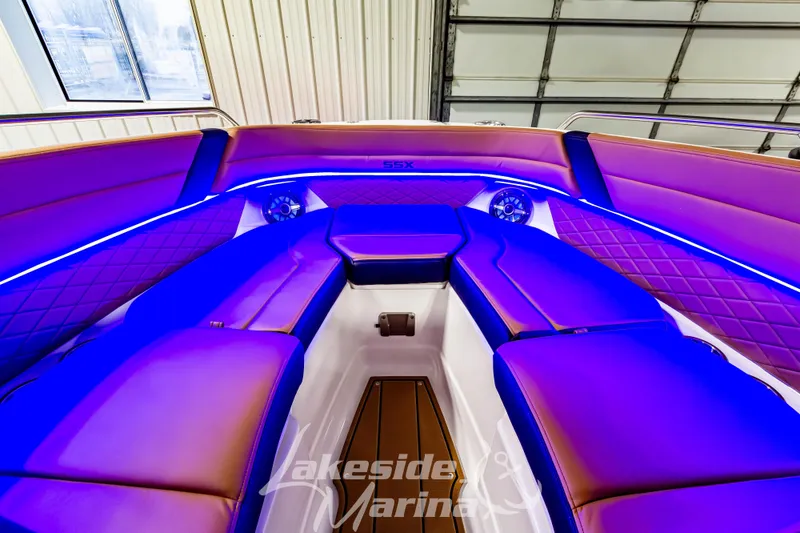 Slide: The Image of Luxurious interior of 2026 Chaparral SSX 6 boat with vibrant LED lighting. - 27