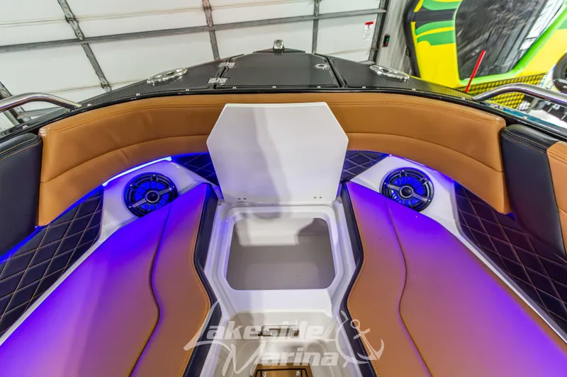 Slide: The Image of Interior of 2026 Chaparral SSX 6 boat with luxurious seating and ambient lighting. - 42