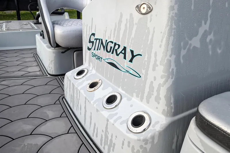 Slide: The Image of 2014 SCB Stingray Sport 25 boat interior with logo and seating detail. - 15