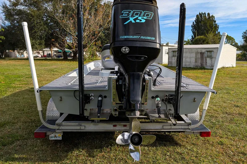 Slide: The Image of 2014 SCB Stingray Sport 25 boat with Mercury 300 XS engine on trailer. - 4