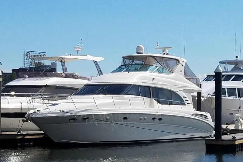 The Image of 2001 Sea Ray 540 Cockpit Motor Yacht docked at marina. - 0
