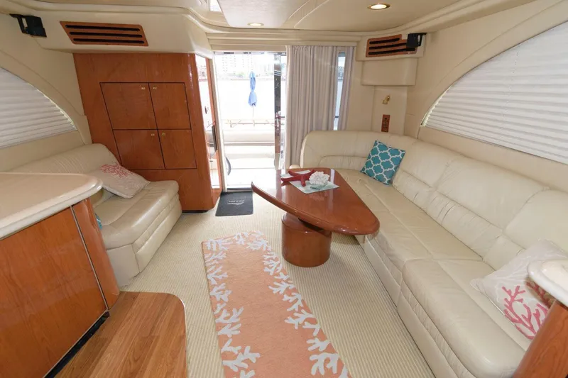 Slide: The Image of Luxurious interior of 2001 Sea Ray 540 Cockpit Motor Yacht with elegant seating and decor. - 11