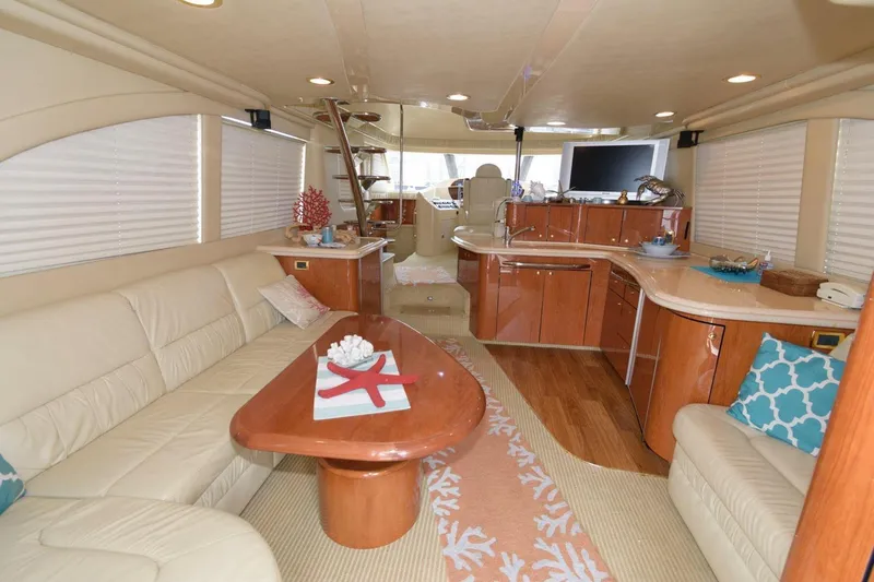 Slide: The Image of Luxurious interior of 2001 Sea Ray 540 Cockpit Motor Yacht with elegant furnishings. - 12
