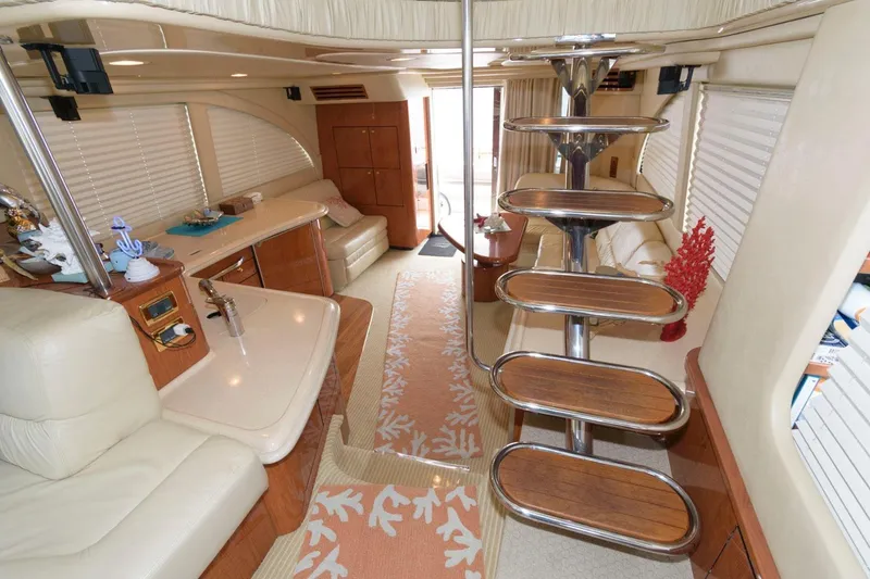 Slide: The Image of Luxurious interior of 2001 Sea Ray 540 Cockpit Motor Yacht with elegant furnishings. - 13