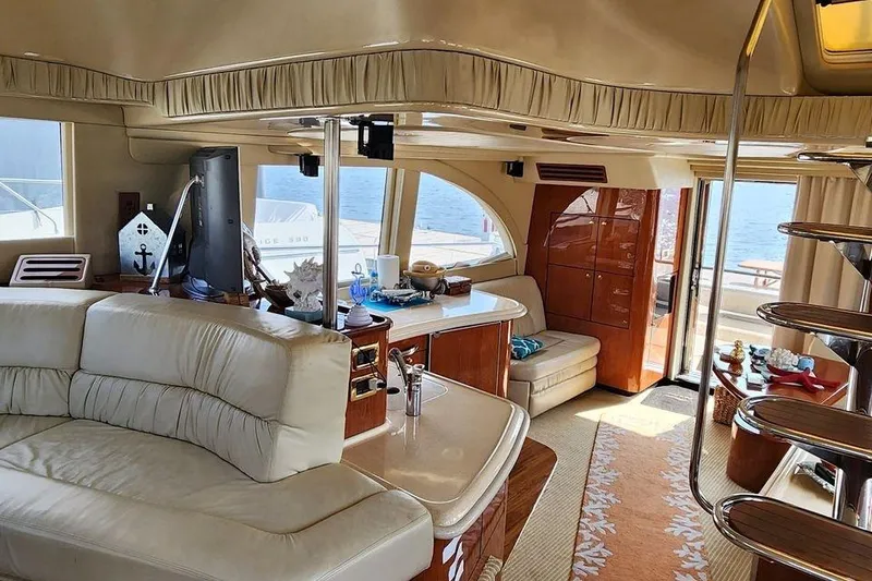 Slide: The Image of Luxurious interior of 2001 Sea Ray 540 Cockpit Motor Yacht with elegant furnishings. - 16