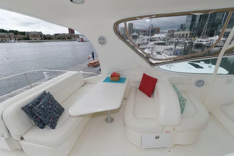 Slide: The Image of Luxurious 2001 Sea Ray 540 Cockpit Motor Yacht interior with waterfront view. - 28