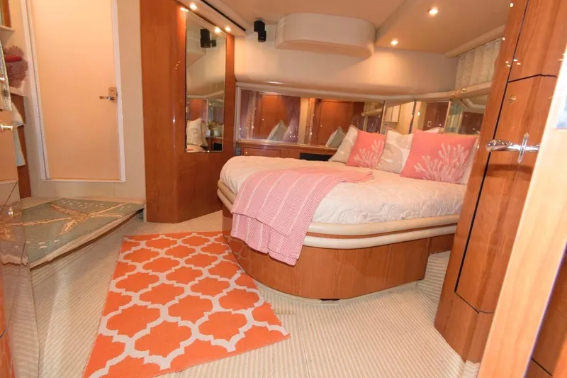 Slide: The Image of Luxurious bedroom in 2001 Sea Ray 540 Cockpit Motor Yacht with elegant decor. - 34