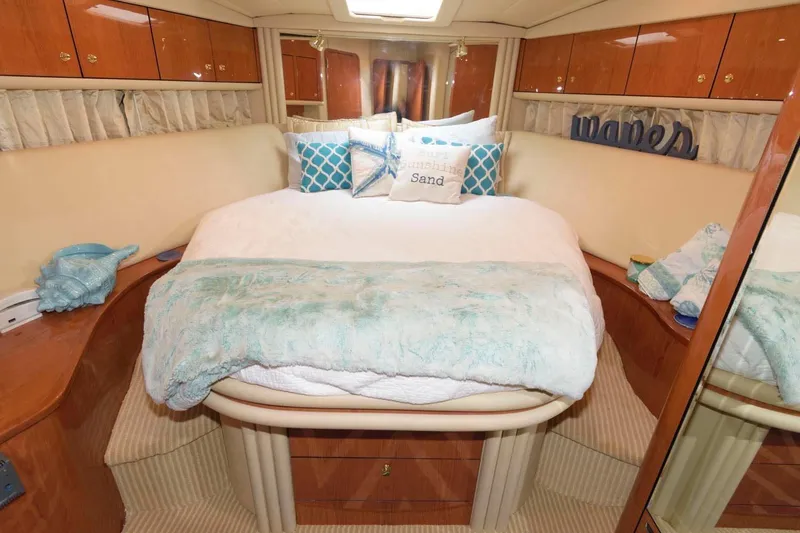 Slide: The Image of Luxurious bedroom interior of 2001 Sea Ray 540 Cockpit Motor Yacht with cozy bedding. - 39
