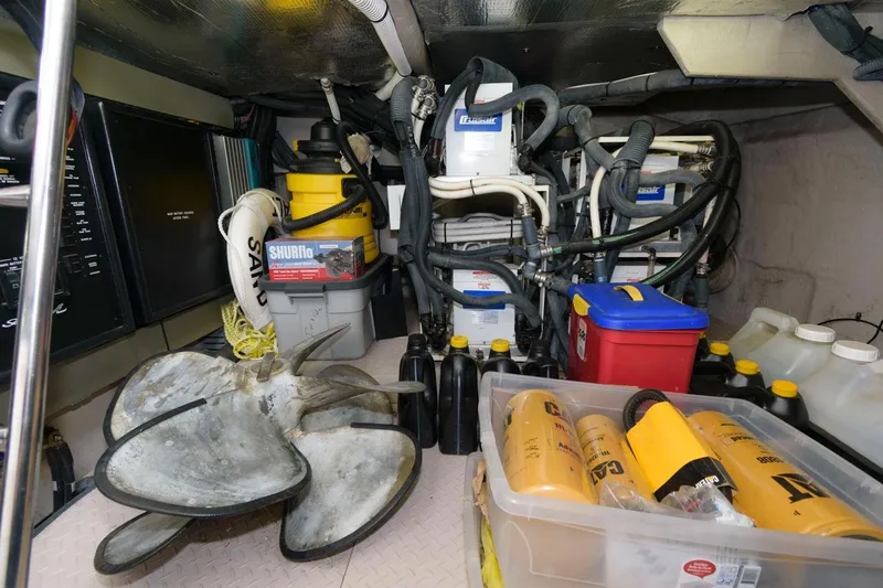 Slide: The Image of Engine room of 2001 Sea Ray 540 Cockpit Motor Yacht with equipment and supplies. - 45
