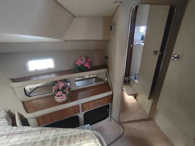 Slide: The Image of Interior of 1987 Chris-Craft 381 Catalina yacht with floral arrangement. - 21