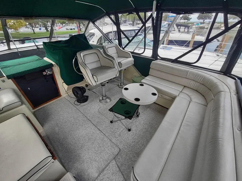 Slide: The Image of Interior of 1987 Chris-Craft 381 Catalina yacht with seating area. - 6