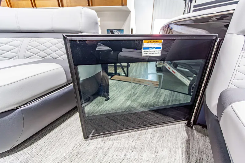 Slide: The Image of 2026 Godfrey Monaco 255 MTF interior with luxury seating and safety gate. - 16