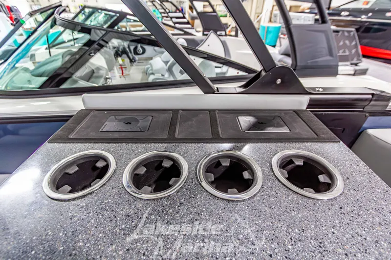 Slide: The Image of Interior of 2026 Godfrey Monaco 255 MTF boat with cup holders and seating. - 32