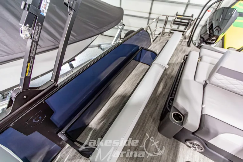 Slide: The Image of 2026 Godfrey Monaco 255 MTF pontoon boat interior with seating and railing details. - 34