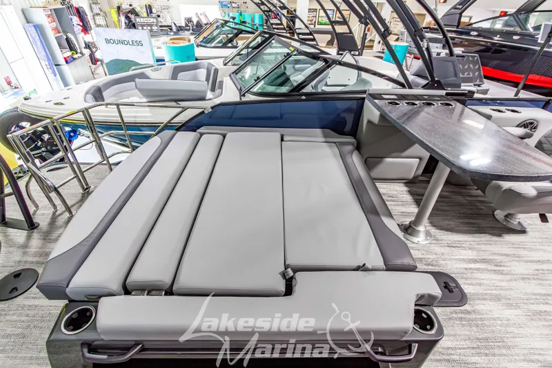 Slide: The Image of 2026 Godfrey Monaco 255 MTF boat interior with seating and table at Lakeside Marina. - 38