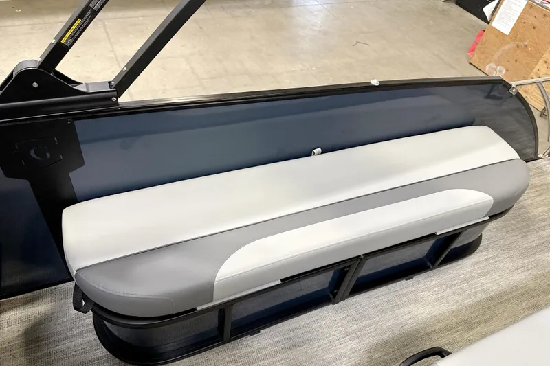 Slide: The Image of 2026 Godfrey Monaco 255 MTF pontoon boat displayed in a showroom. - 7