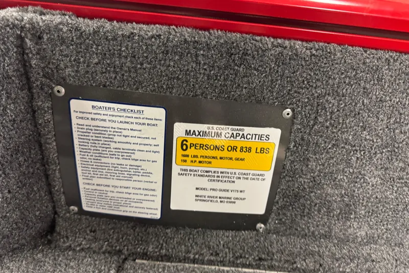 Slide: The Image of Capacity label on 2026 Tracker Pro Guide V-175 WT boat, seating six people or 838 lbs. - 12