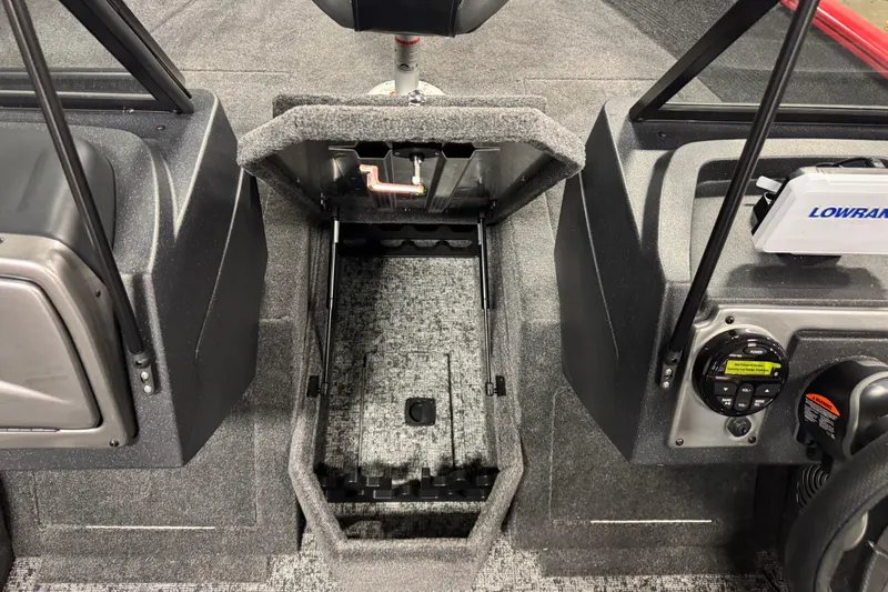 Slide: The Image of 2026 Tracker Pro Guide V-175 WT boat interior with console and storage compartments. - 18