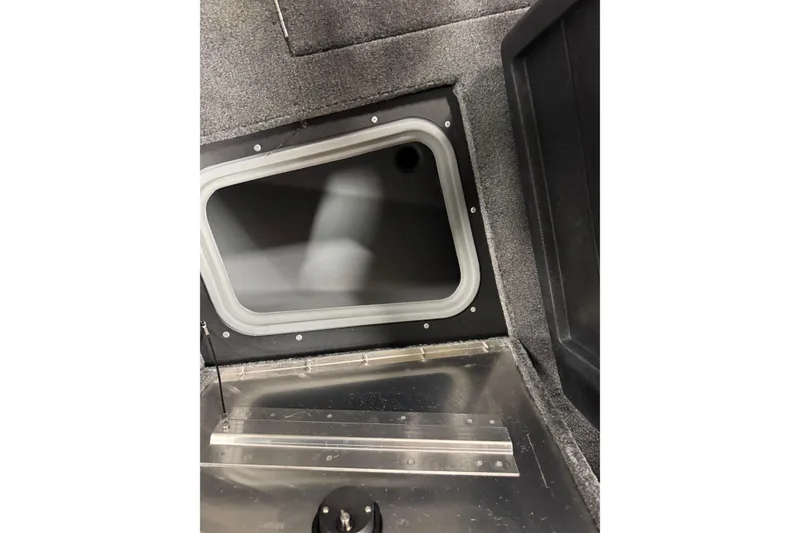 Slide: The Image of Interior view of 2026 Tracker Pro Guide V-175 WT boat compartment. - 22