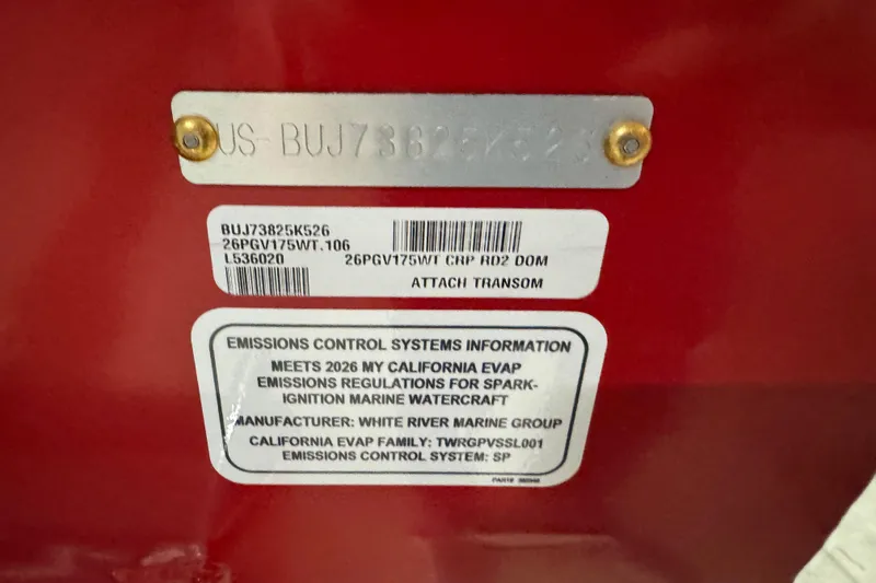 Slide: The Image of Emissions control label on 2026 Tracker Pro Guide V-175 WT boat, red background. - 6