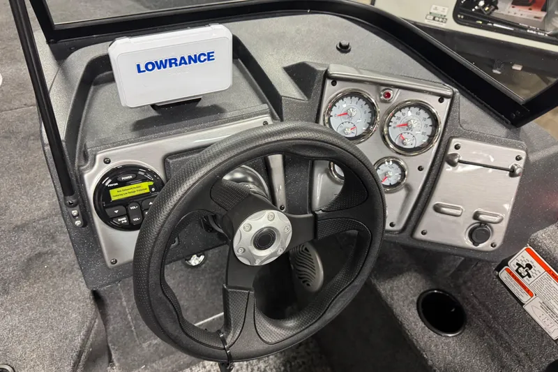 Slide: The Image of 2026 Tracker Pro Guide V-175 WT boat dashboard with Lowrance display and gauges. - 8