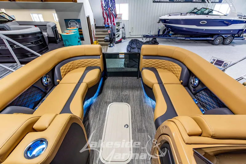 Slide: The Image of Luxurious interior of 2026 Godfrey Monaco 255 MTF pontoon boat with tan seating. - 14