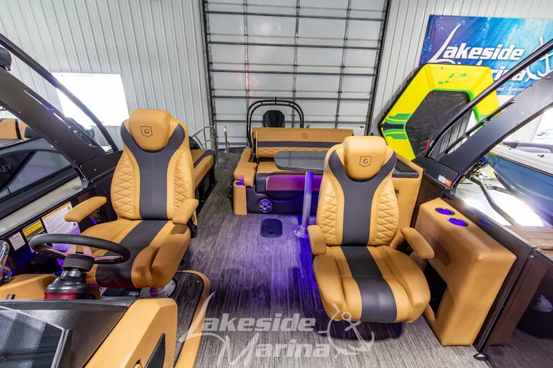 Slide: The Image of Luxurious interior of 2026 Godfrey Monaco 255 MTF boat at Lakeside Marina showroom. - 18