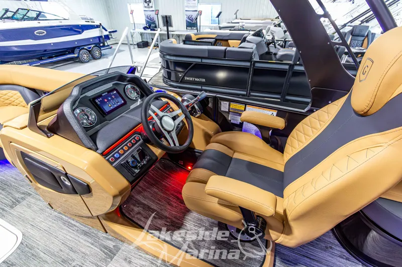 Slide: The Image of Luxurious interior of 2026 Godfrey Monaco 255 MTF boat with modern dashboard and seating. - 23
