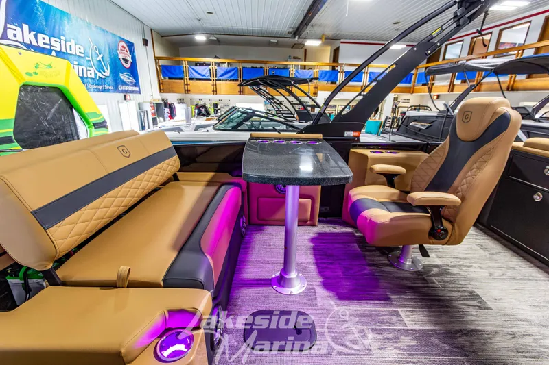 Slide: The Image of Luxurious interior of 2026 Godfrey Monaco 255 MTF pontoon boat at Lakeside Marina. - 27