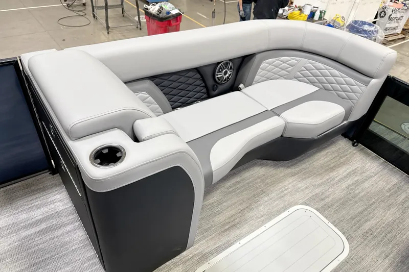 Slide: The Image of Luxurious seating on 2026 Godfrey Monaco 255 MTF pontoon boat with cup holder and speaker. - 3
