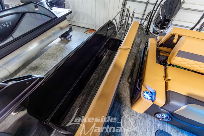 Slide: The Image of 2026 Godfrey Monaco 255 MTF pontoon boat interior with luxurious seating and modern design. - 32