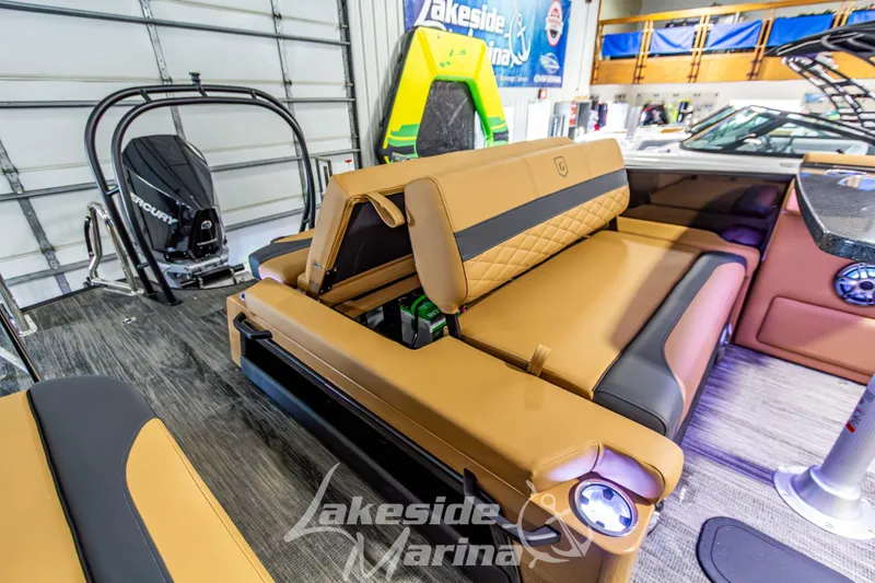 Slide: The Image of 2026 Godfrey Monaco 255 MTF boat interior with luxurious seating at Lakeside Marina. - 33