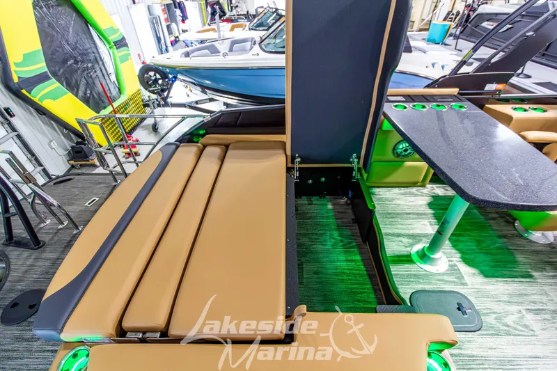 Slide: The Image of 2026 Godfrey Monaco 255 MTF boat interior with seating and table, Lakeside Marina. - 39