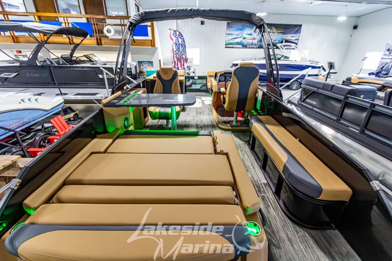 Slide: The Image of Luxurious 2026 Godfrey Monaco 255 MTF pontoon boat interior with plush seating and modern design. - 43