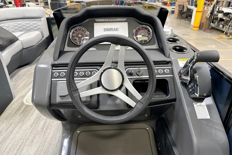 Slide: The Image of Steering console of 2026 Godfrey Monaco 255 MTF pontoon boat with modern controls. - 8