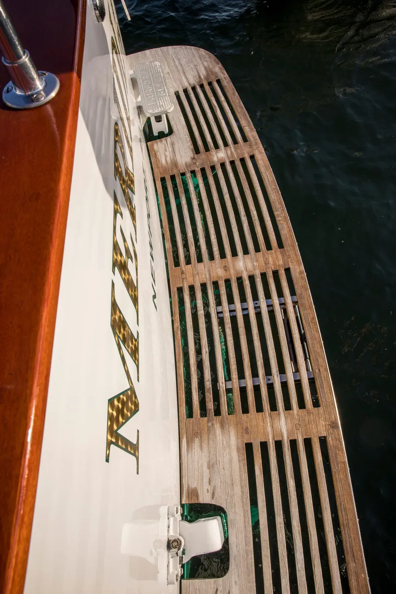 Slide: The Image of 1964 Huckins Out Islander 56 yacht with wooden deck detail. - 6