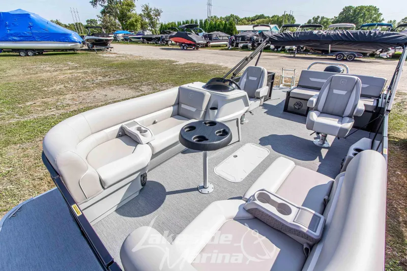 Slide: The Image of Interior of 2026 Godfrey Sweetwater 2286 SFLX pontoon boat with spacious seating and modern design. - 11
