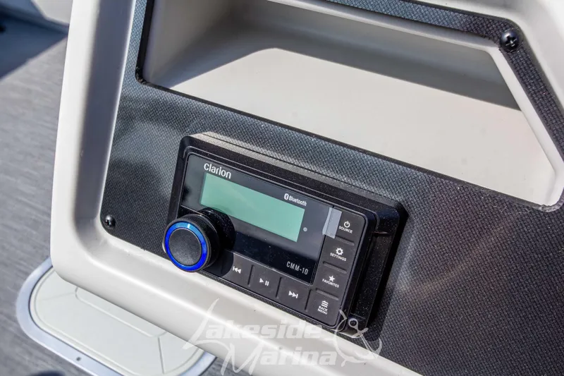 Slide: The Image of Clarion audio system on 2026 Godfrey Sweetwater 2286 SFLX boat dashboard. - 21
