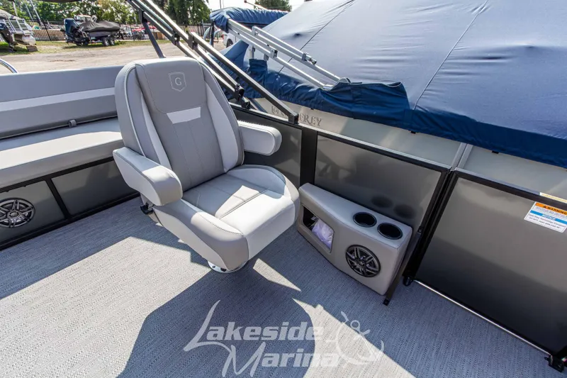 Slide: The Image of 2026 Godfrey Sweetwater 2286 SFLX boat interior with cushioned seating and cup holders. - 23