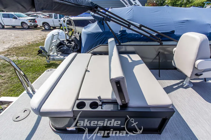 Slide: The Image of 2026 Godfrey Sweetwater 2286 SFLX pontoon boat interior with seating and cup holders. - 27